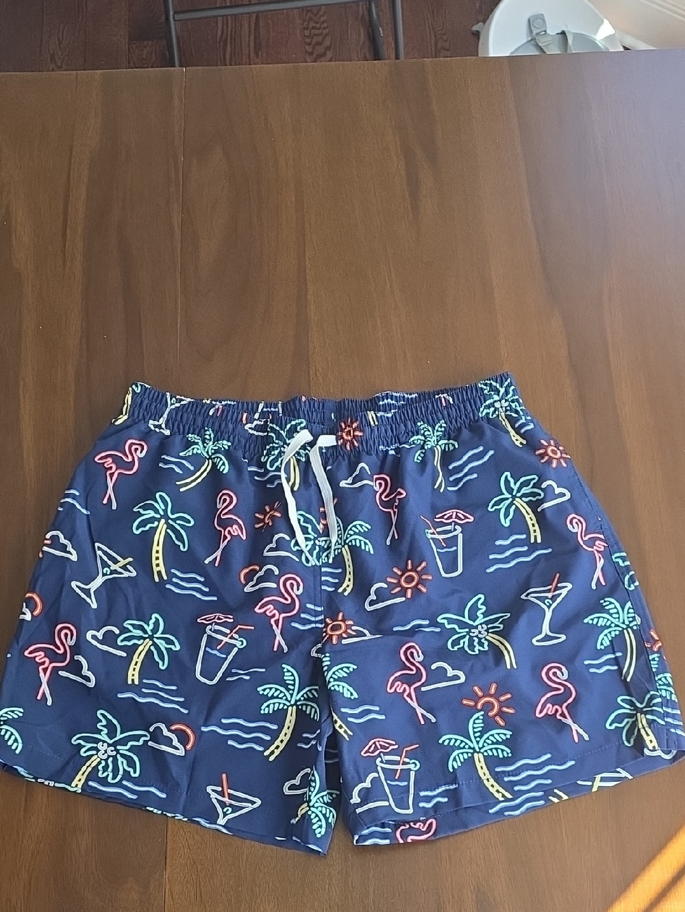Chubbies - Navy Swim Trunks with Neon Tropical Motifs